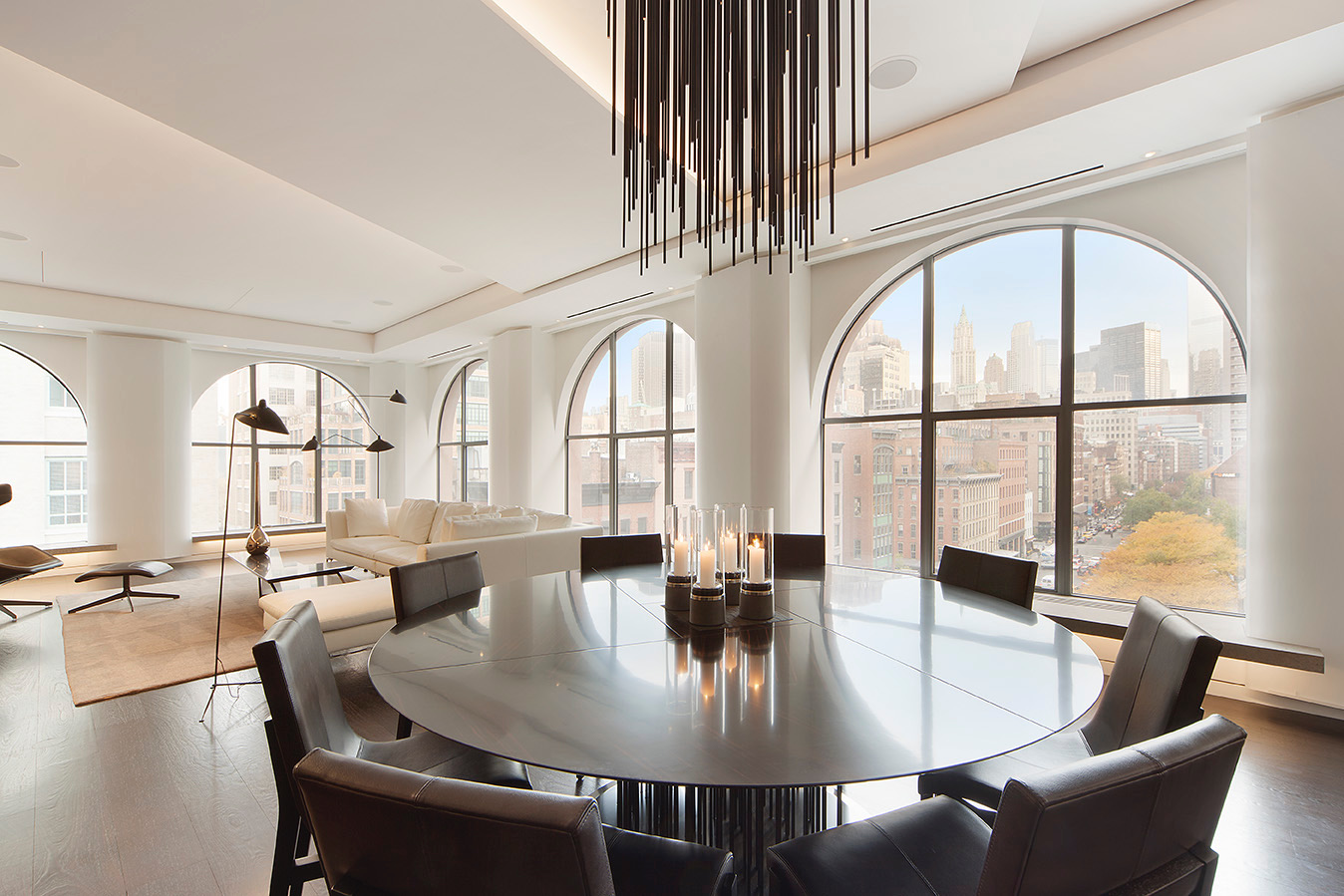 Luxury condo entry with designer millwork and soft, integrated lighting for a curated arrival
